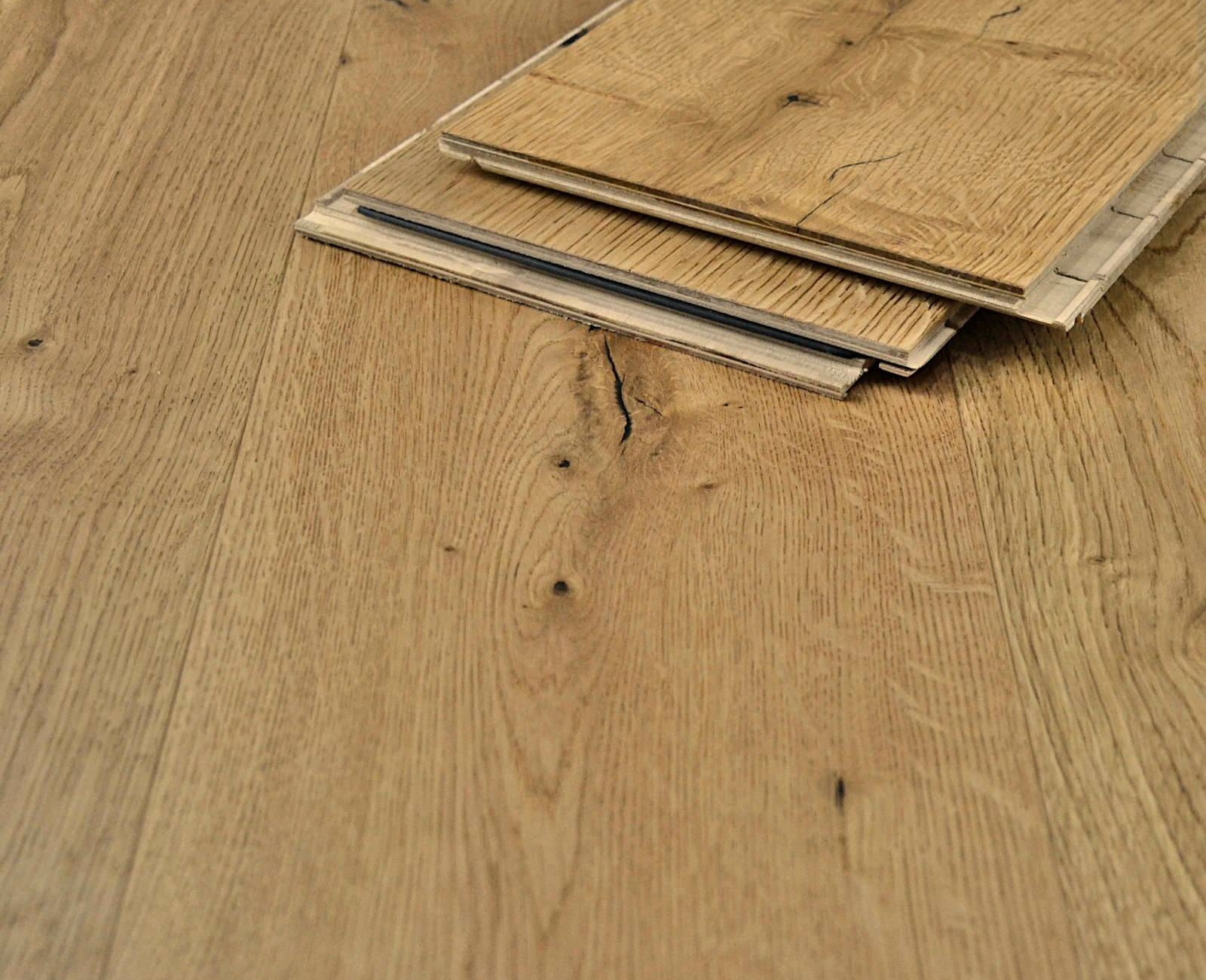 The grain and natural figure of engineered oak flooring